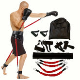 A man wears black boxing gloves and shorts while using the 12-Piece Heavy Duty Resistance Boxing Training Set for MMA, Home Boxing & Taekwondo, with red bands and black accessories shown separately on a white background.