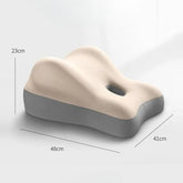 The Multi-Functional Ergonomic Bed Pillow is a wedge-shaped beige and gray memory foam waist cushion with a central hole, measuring 23×48×41 cm, designed for support. Shown on a plain white surface.