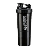 A black 3 Layers Shaker Protein Bottle with a flip-top lid, vertical grooves, and the YUP1 logo in white. Features a compartmentalized screw-on design for body building, inspired by innovation from Mainland China.