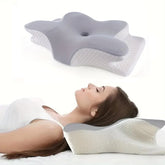 A woman lies on her back with her head supported by the Memory Foam Pillows Butterfly Shaped Relaxing Cervical Pillow; the orthopedic, slow rebound pillow is also shown separately above for detail.