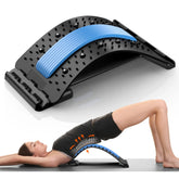 A woman demonstrates manual use of the Showlu Well Nation Store Back Stretcher for Back Pain Relief, a multi-level back cracker board that arches the spine to provide lower and upper back support for herniated disc pain.