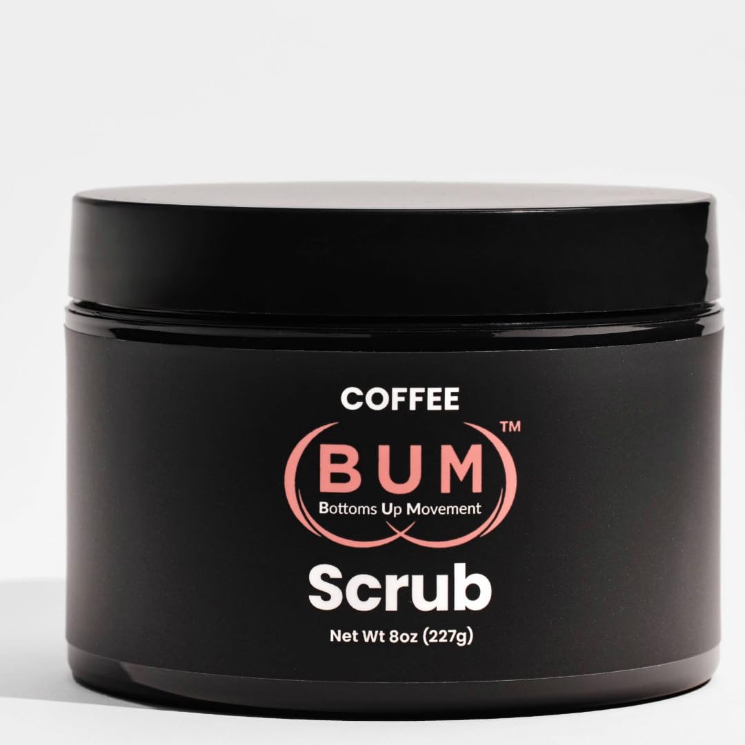 A black container labeled Coffee (BUM) Scrub by Showlu Well Nation Store, containing 8 oz (227g) of exfoliating foot, hand, body, and butt scrub with jojoba, rosehip, and vitamin E is shown against a plain white background.