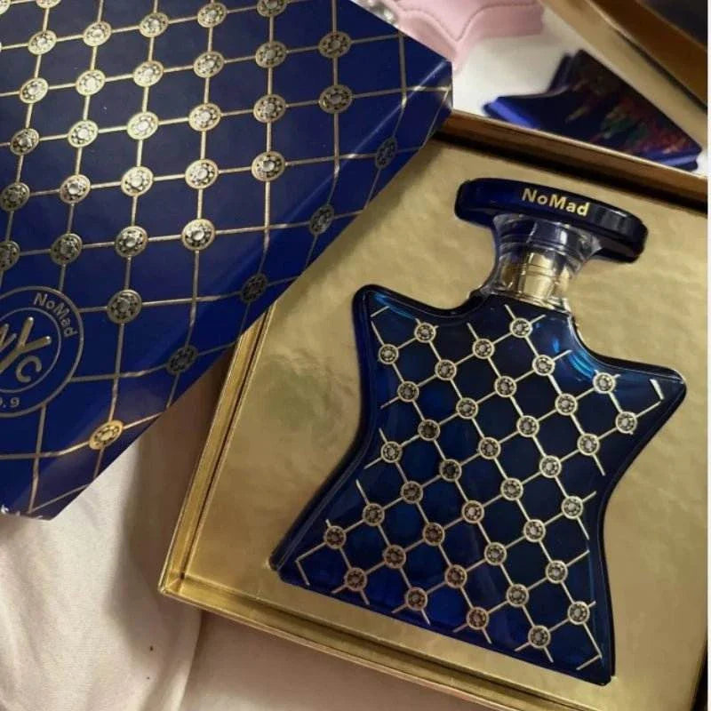 Blue star-shaped American Chinatown unisex floral perfume bottle with gold geometric pattern and matching box