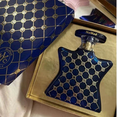 Blue star-shaped American Chinatown unisex floral perfume bottle with gold geometric pattern and matching box