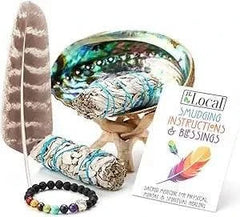 White Sage Bundles smudging kit with abalone shell, feather, chakra bracelet, and instructions for smoke cleansing