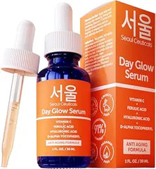 A blue dropper bottle of SeoulCeuticals Korean Skin Care 20% Vitamin C Hyaluronic Acid Serum + CE Ferulic Acid sits beside its orange box. This potent anti-aging serum targets wrinkles, promoting radiant, youthful skin.