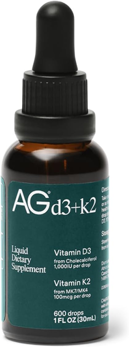 A brown glass dropper bottle labeled AG1 Vitamin D3 K2 Drops by Athletic Greens offers 1000IU D3 and 100mcg K2 per serving, supporting bone density and calcium absorption. Each 1 fl oz (30mL) bottle contains 600 drops.