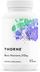 A white bottle of THORNE Basic Nutrients 2/Day features a colorful label and contains 60 capsules of a comprehensive daily multivitamin and mineral formula, gluten, dairy, and soy free for optimal bioavailability.