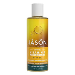 A 4 fl. oz. bottle of JASON Vitamin E 5,000 IU Moisturizing Body Oil for hair, face, and body leaves skin deeply moisturized. This cruelty-free oil comes with a yellow and orange label.