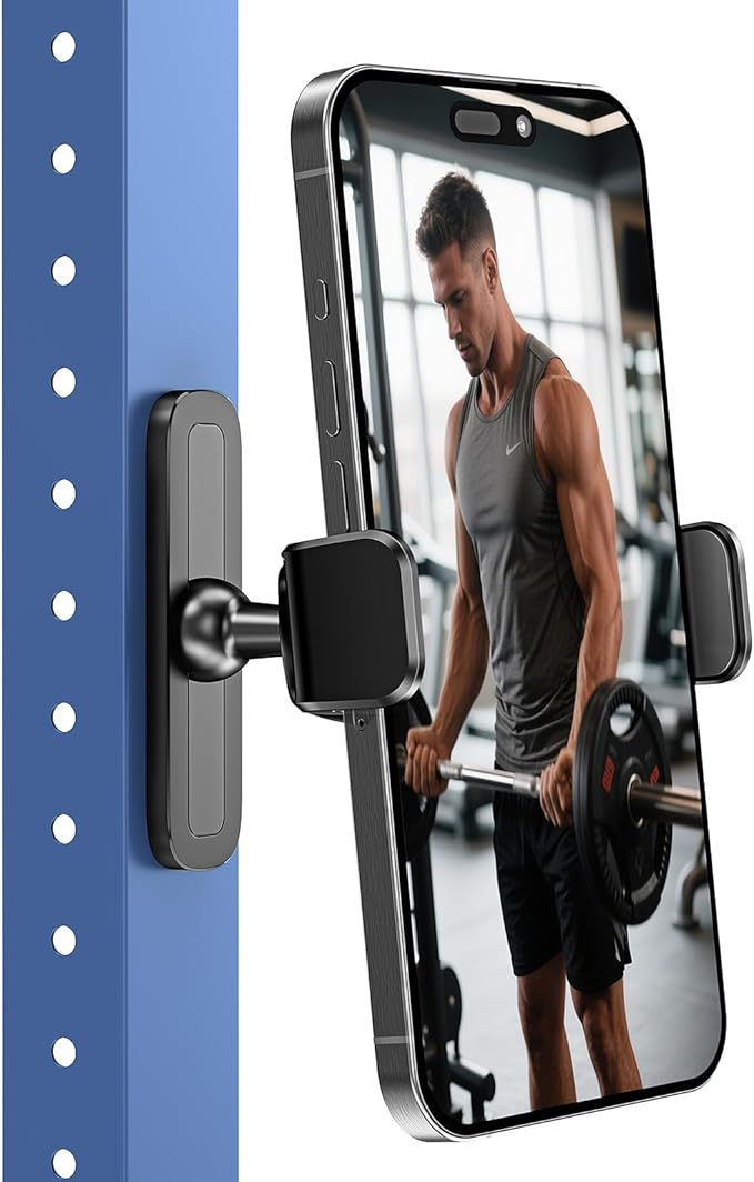 A smartphone on a blue metal surface is held by the APPS2Car Magnetic Phone Holder for Gym, featuring an alloy base, strong hold, and 360° adjustability; it displays a man lifting a barbell in a gym.