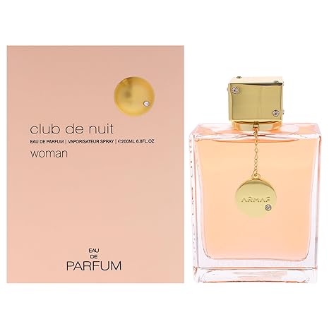 The Showlu Well Nation Store Club de Nuit for Women Eau de Parfum Spray (6.8 oz/200 ml) features a gold cap and pendant, comes with a beige box with minimalist text and gold circle, and offers a long-lasting Floral Fruity scent.