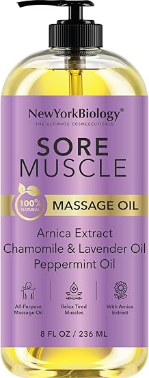 New York Biology Sore Muscle Massage Oil 8 Fl Oz features natural oils, a soothing formula that absorbs easily, a pump dispenser, and comes in a bottle with a purple and gold label.