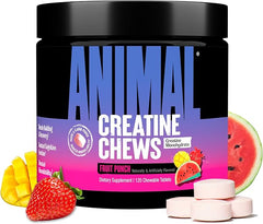 A container of Animal Creatine Chews Tablets – Fruit Punch, featuring enhanced creatine monohydrate with AstraGin and sea salt, is shown with mango, strawberry, and watermelon images beside five round pink chewable tablets.