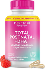 A bottle of Pink Stork Total Postnatal Vitamins for Women with Vegan DHA, Iron, Folate, and B12 features a pink-yellow label with raspberries and capsules, highlighting key nutrients for postpartum recovery and breastfeeding moms.