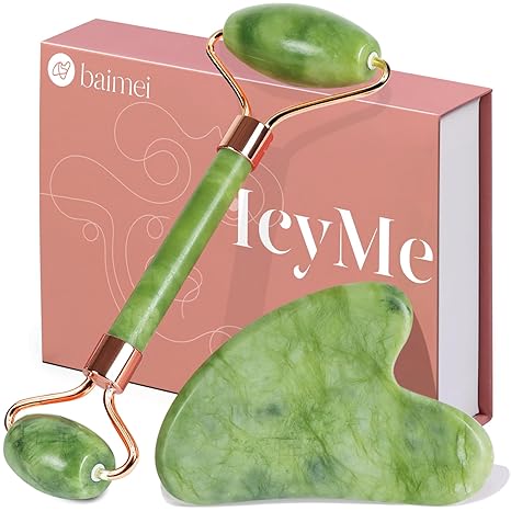 The BAIMEI IcyMe Gua Sha & Jade Roller Set, both green and marbled, are shown in front of a pink BAIMEI box with white text—a skincare set for puffiness and redness, perfect as a self-care gift for men and women.