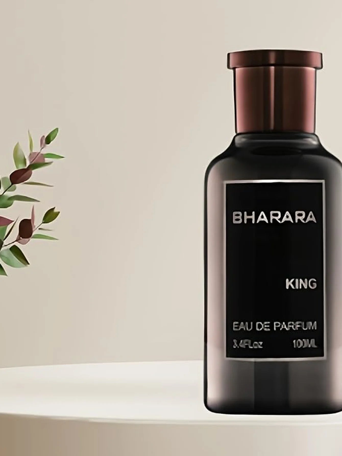 A dark glass bottle labeled Bharara King Eau de Parfum for Men – Citrus Amber Scent 3.4 FL OZ 100 ML rests on a white surface, with a small plant in the background—a fragrance for confident daily wear and evening sophistication.