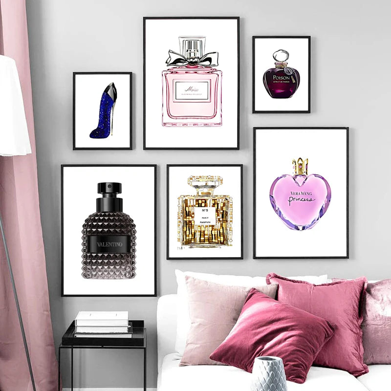 A modern living room wall features six Fashion Perfume Bottle Prints Nordic Posters in a grid above a white sofa with pink and white cushions, next to a pink curtain. These canvas paintings add luxurious decor to bedrooms or living rooms.