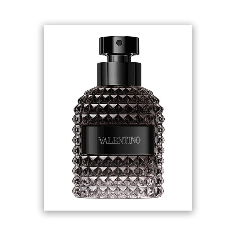 A Fashion Perfume Bottle Prints Nordic Poster features a textured glass perfume bottle with a black label, perfect as luxurious wall art or canvas painting decor for the bedroom or living room—ideal gift for women.