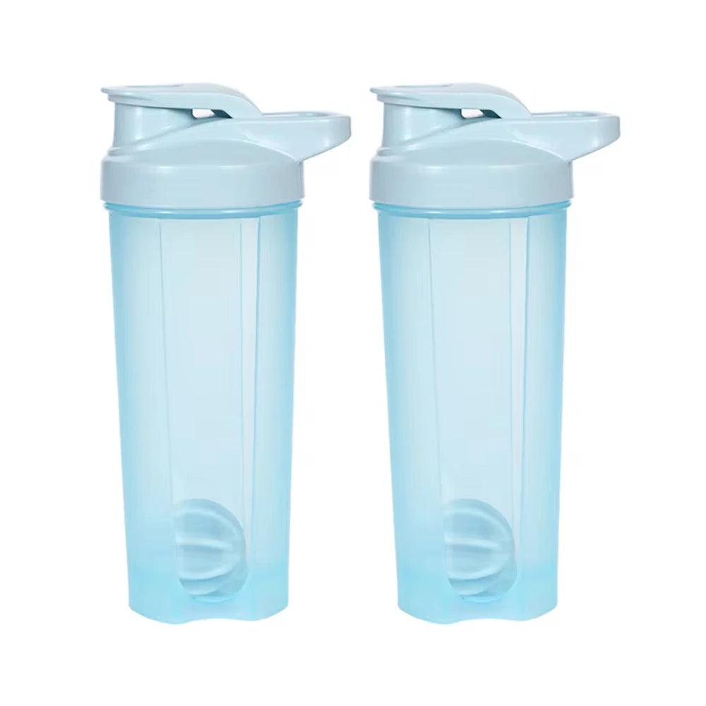Two identical 28 oz Shaker Bottles for Protein Shakes with ball blender whisk and handle are shown side by side against a plain white background. These travel shaker cups are made without chemicals in Mainland China.