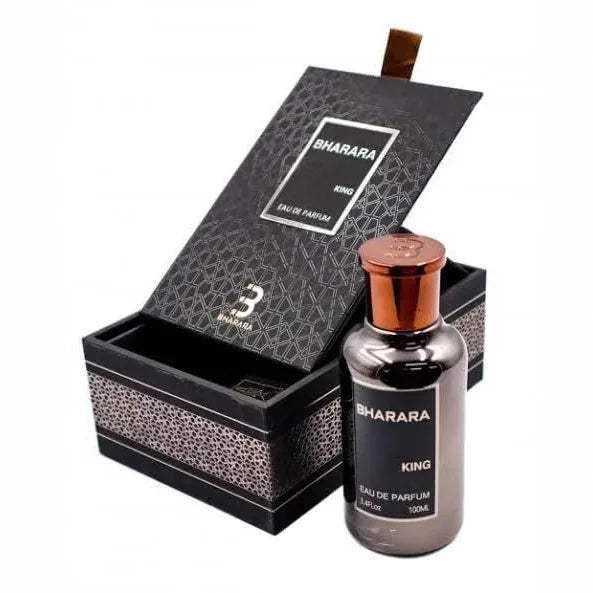 A black and silver BHARARA KING box sits open with a matching dark glass perfume bottle beside it, featuring a copper cap. This 100ML Brand Musk Perfume Spray offers a long-lasting citrus floral light fragrance—perfect as a seductive romance gift.