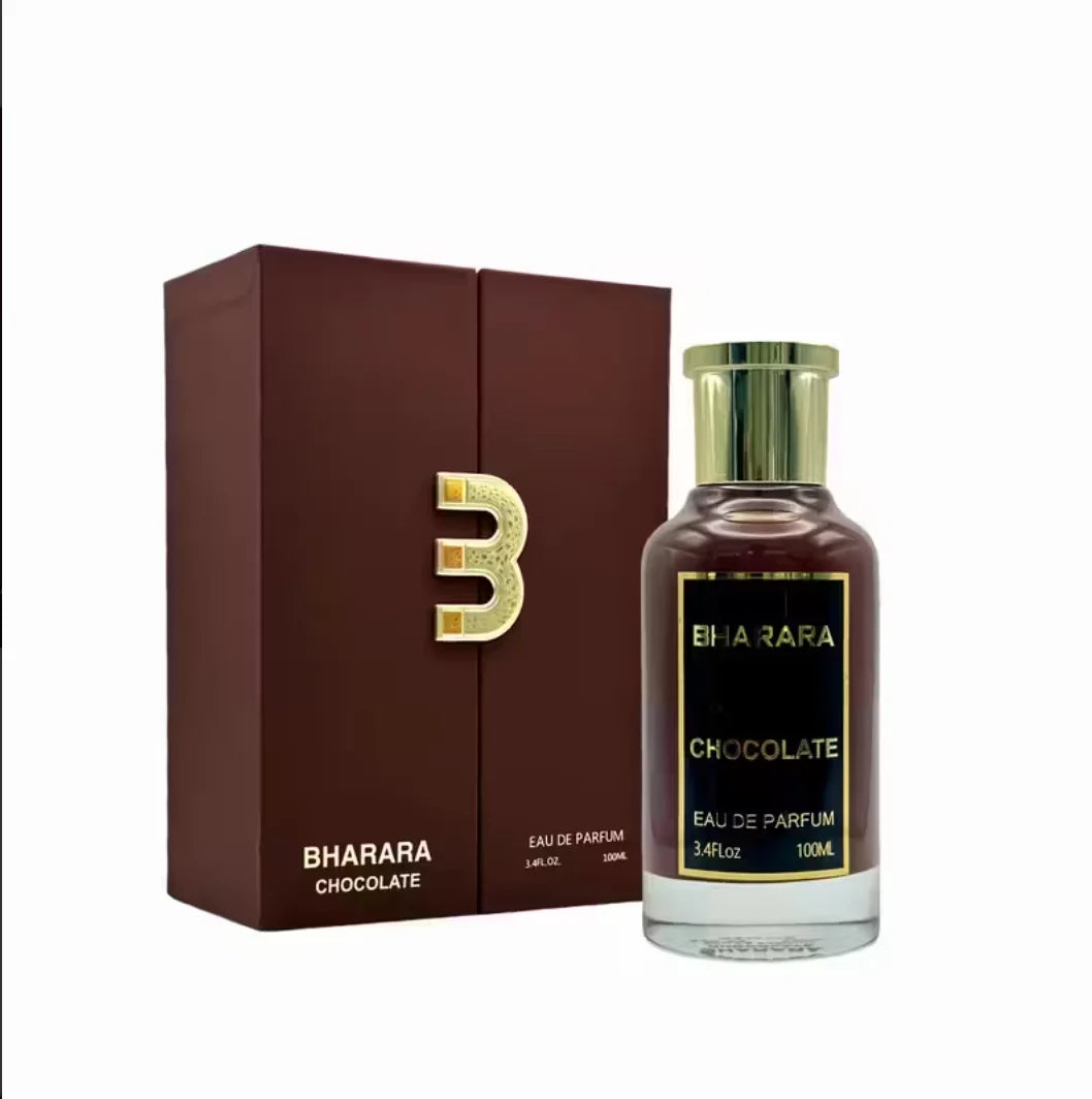 A bottle of Bharara Unisex 3.4 Ounce Eau de Parfum – Long-lasting sits beside its matching brown box with gold B logo, featuring a gold cap and black label, containing an alluring fragrance for all.