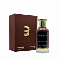 A bottle of Bharara Unisex 3.4 Ounce Eau de Parfum – Long-lasting sits beside its matching brown box with gold B logo, featuring a gold cap and black label, containing an alluring fragrance for all.
