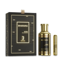The Bharara King Gold Edition Eau de Parfum (100 ml), inspired by elite gourmand classics, comes in a black and gold set with a rectangular box, gold perfume bottle, and a matching travel spray—all displayed upright.
