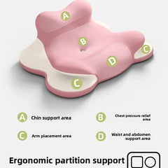 The Bed Lie Down Pillow features ergonomic pink and beige memory foam with labeled sections: A for chin support, B for chest relief, C for arms, and D for waist/abdomen. Text: Ergonomic partition support. Ideal as a leg pillow, backrest, or reading wedge.
