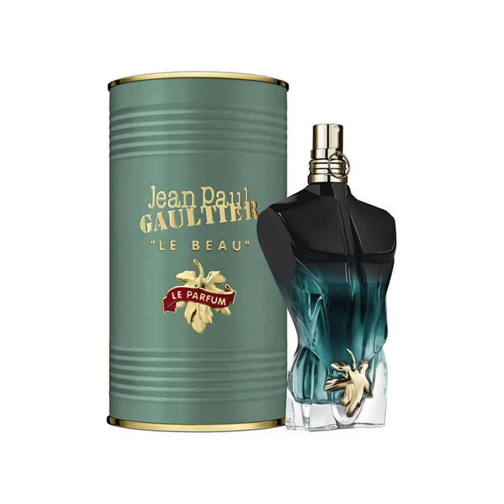 Jean Paul Gaultier Les Males De Le Beau Le Parfum Eau De Parfum Powerful Perfume 125ml comes in a green cylindrical box with gold text, alongside a torso-shaped bottle with a gold and blue gradient and gold leaf detail—an alluring unisex fragrance.