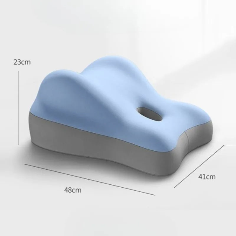 The Multi-Functional Ergonomic Bed Pillow is a blue and gray memory foam waist cushion with a central hole, made from 100% cotton. Its wavy, wedge-shaped design (48×41×23 cm) offers optimal support and comfort.
