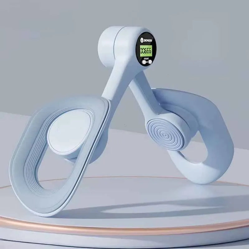 The Non-Slip Comfortable Pelvic Floor Muscle Trainer Thigh Exerciser, shown in light blue on a round platform, features two circular bands connected by curved arms for effective leg and butt training and postpartum recovery.