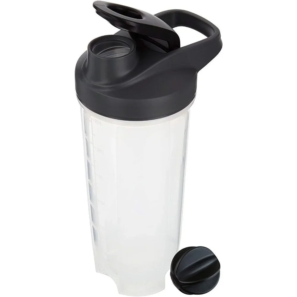 A clear, chemical-free 28 oz shaker bottle for protein shakes by FEB.WIND, featuring measurement markings, a black flip-top lid, a removable ball blender whisk beside it, and a handle. Made in Mainland China.