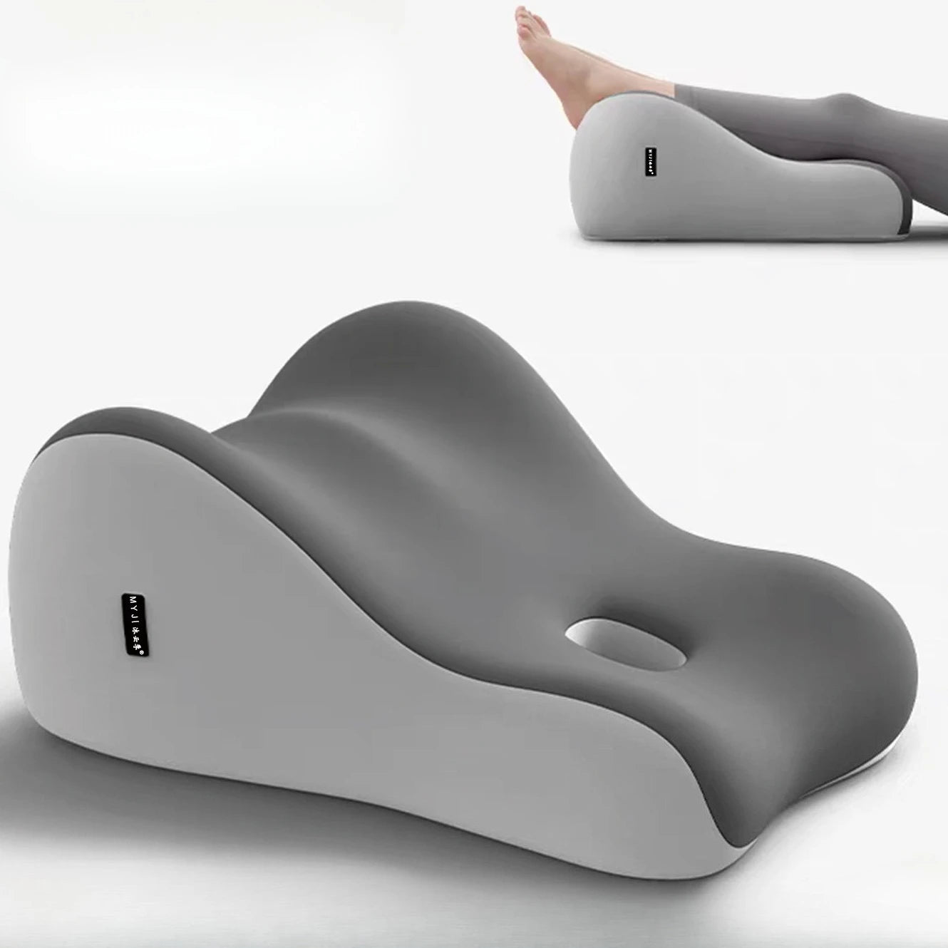 The Intimacy Support Wedge Pillow for Couples is a gray, contoured memory foam cushion with a small hole, shown elevating legs and alone on white. Made in Mainland China, it's designed for back, neck & waist pain relief and features a washable cover.