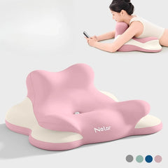 A woman lies on her stomach, supported by a pink and white Bed Lie Down Pillow Multifunctional Prone Position Lie Down Pillow as she looks at her phone. Four color options for the wedge pillow are shown in the bottom right corner.
