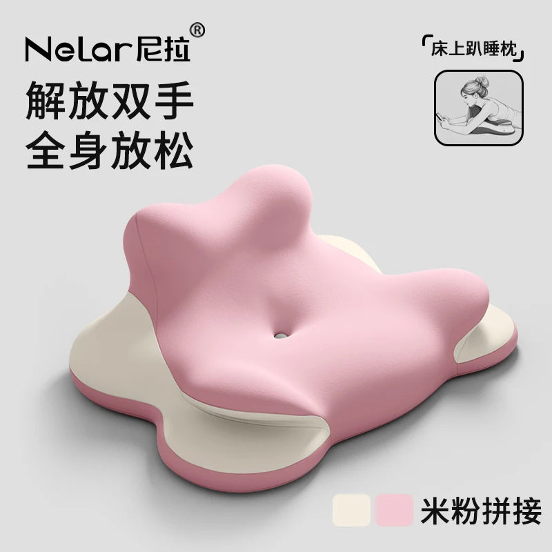 The Bed Lie Down Pillow is a pink and cream ergonomic memory foam wedge with arm and leg supports, Chinese text, and a person resting face down – ideal as a multifunctional prone position pillow or reading/backrest cushion.