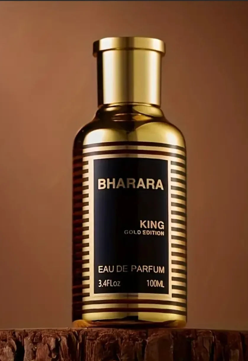 A 3.4 oz bottle of Bharara Men's Eau de Parfum, perfect as a holiday gift, stands on a wooden surface against a plain brown background.