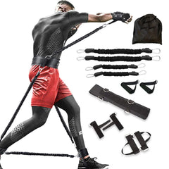 A user demonstrates the 12-Piece Heavy Duty Resistance Boxing Training Set for MMA, Home Boxing & Taekwondo, featuring elastic bands, handles, ankle straps, and a carrying bag—ideal full body strength equipment for arms and legs.