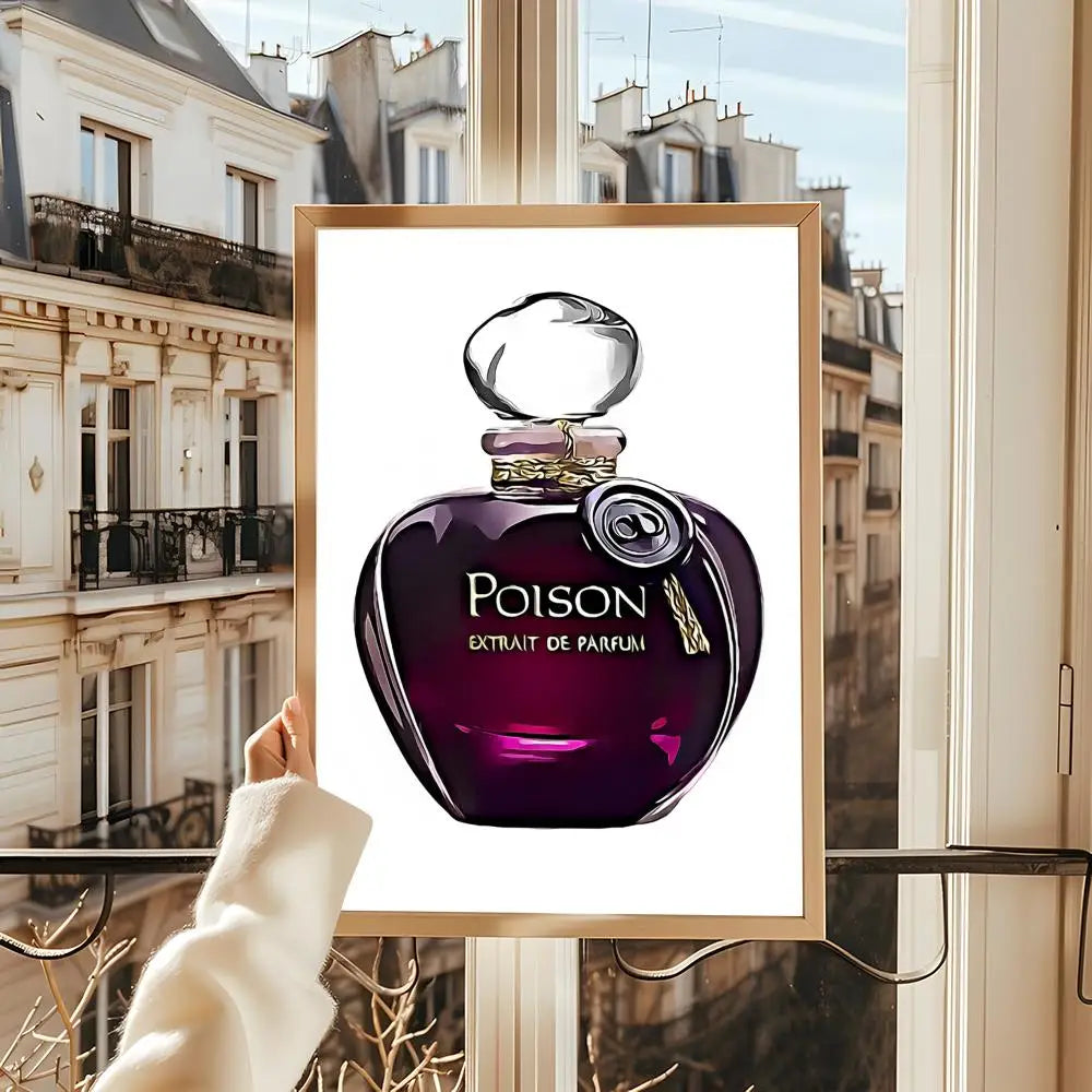 A hand holds the Perfume Bottle Prints Nordic Poster Wall Art in front of a window with Parisian buildings—ideal home decor for lovers of stylish perfume art, perfect for living rooms, bedrooms, bars, or as mural painting decoration.