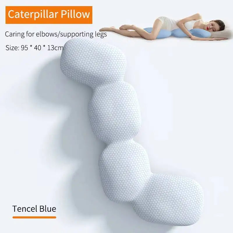 A blue, segmented Memory Foam Hold In Bed Sleeping Body Pillow (95×40×13 cm) is shown. A person rests on their side, hugging the removable, washable ice silk pillow designed to support legs and elbows—ideal for pregnant women.