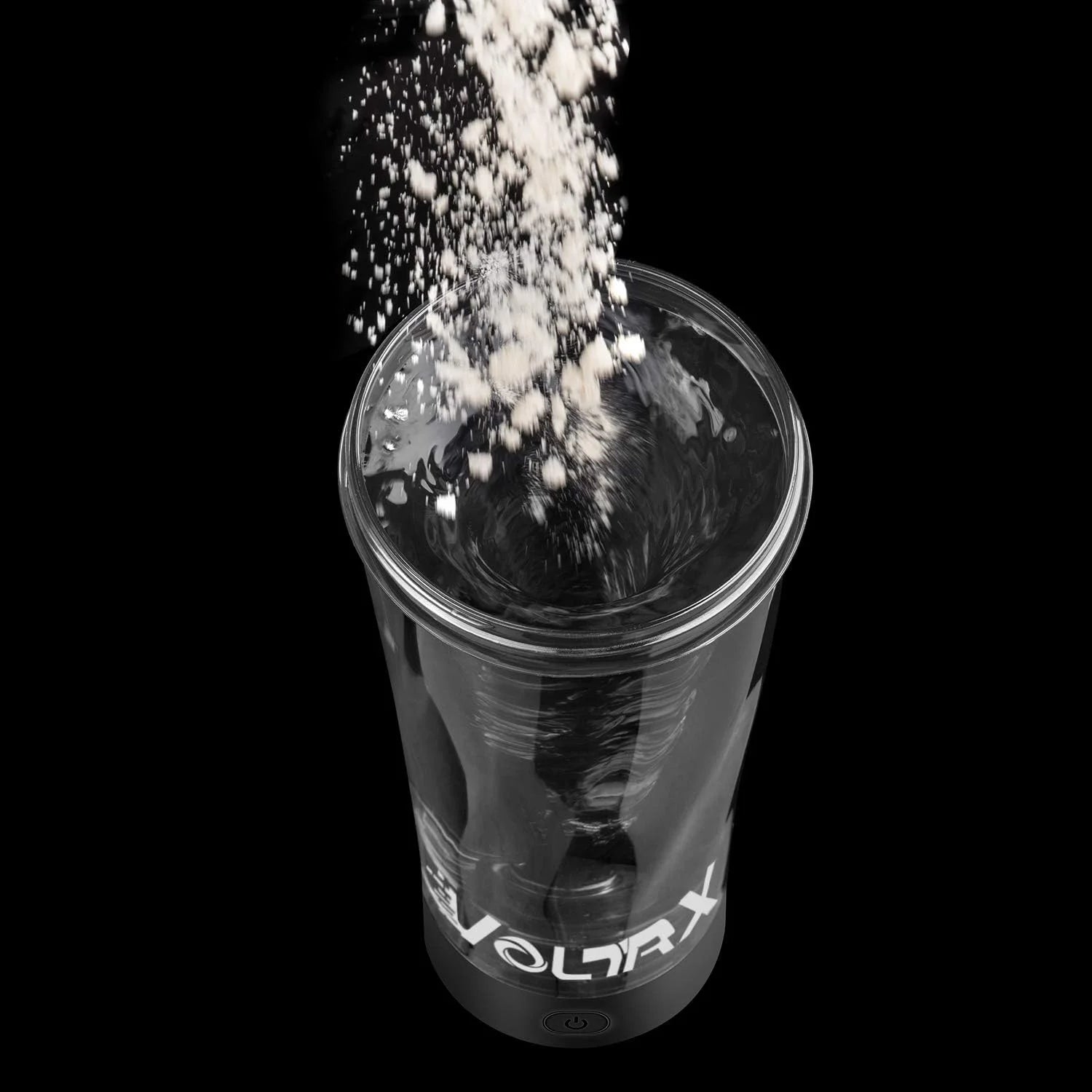 Protein powder pours into the Premium Electric Protein Shaker Bottle, a USB rechargeable portable mixer cup for fitness protein shakes, mixing with water as it swirls inside the clear bottle against a black background.