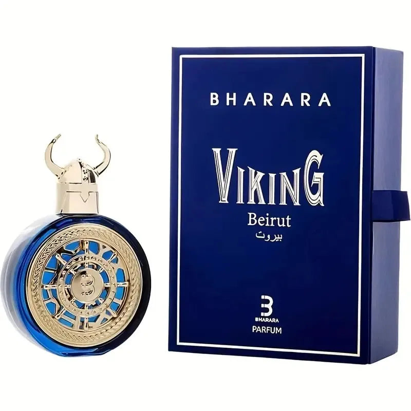 A blue and gold bottle of Bharara Unisex 3.4 Ounce Eau de Parfum is displayed beside its matching blue box with bold white branding. Inspired by Jean Paul Gaultier, this long-lasting, alcohol-free fragrance suits all genders.