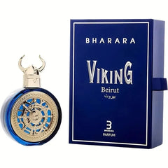 A blue and gold bottle of Bharara Unisex 3.4 Ounce Eau de Parfum is displayed beside its matching blue box with bold white branding. Inspired by Jean Paul Gaultier, this long-lasting, alcohol-free fragrance suits all genders.