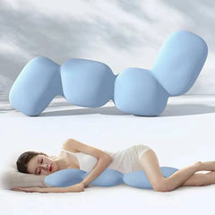 A woman in a white tank top and shorts sleeps on her side, hugging the Memory Foam Hold In Bed Sleeping Body Pillow for Pregnant Women, an ice silk comfort orthopedic cushion with a removable washable cover; an identical pillow is in the background.