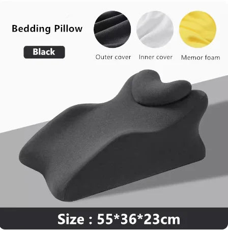 The Lie On The Bed Sleeping Pillow is a black ergonomic cushion with raised knee and head support, shown on a gray background. Made with 100% polyester outer cover and memory foam filling. Size: 55×36×23 cm. Labeled sections highlight key features.