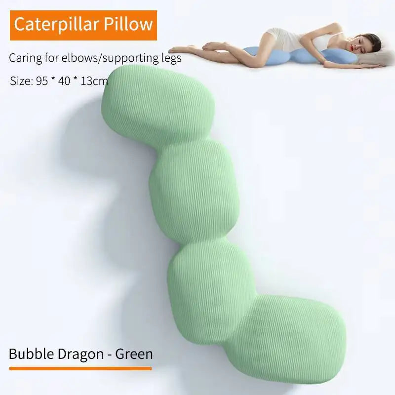 A woman rests on her side hugging the Bubble Dragon-Green Memory Foam Hold In Bed Sleeping Body Pillow (95*40*13cm). The removable, washable ice silk cover supports her elbows and legs, providing orthopedic comfort for pregnant women.