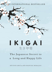 Book cover of "Ikigai: The Japanese Secret to a Long and Happy Life" featuring a minimalist design with cherry blossom branches on a light blue background.