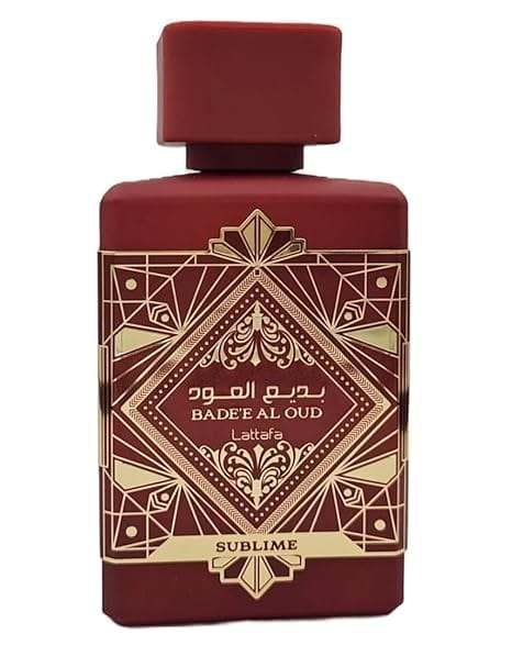 Lattafa Badee Al Oud Sublime unisex eau de parfum bottle with red geometric design, 3.4 oz, woody aromatic fragrance with apple, litchi, rose, plum, jasmine, moss, vanilla, and patchouli notes.